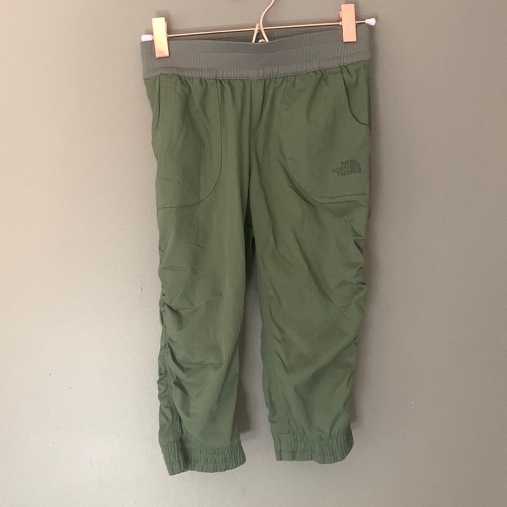 The North Face Girls green outdoor capri pants.  Size small, 7-8